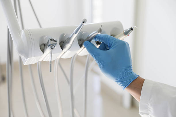 Professional Tooth Extraction technician working in Nashville, TN
